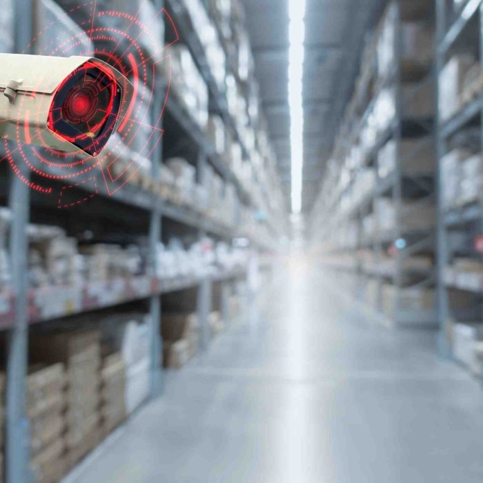 CCTV. security camera motion detect system operating in warehouse interior with product on shelves in shopping mall, cctv solution management , surveillance security, intelligent technology concept